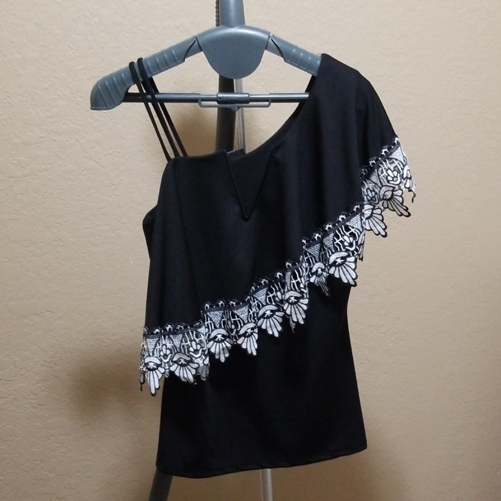 Black and white asymmetrical top
